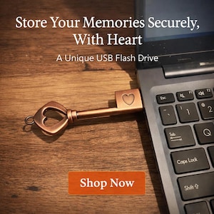 May include: A unique USB flash drive shaped like a key, with a heart-shaped cutout and a heart symbol on the key's head. The bronze-colored key is plugged into a laptop. The text reads "Store Your Memories Securely, With Heart."