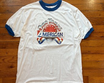 Vintage 1980’s Single Stitch Funny One Tough American Patriot Ringer Tee - Large