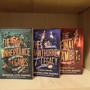 Annotated Copy of The Inheritance Games Trilogy by Jennifer Lynn Barnes