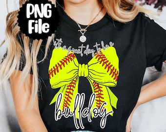May include: A black t-shirt with a yellow and red softball bow and the text "It's a great day to be a bulldog".