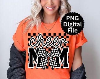 May include: Orange t-shirt with the words "cheer MOM" in a white script font and bold block letters. A black and white checkered bow is centered between the words. A black starburst graphic with the text "PNG Digital File" is in the upper right corner.