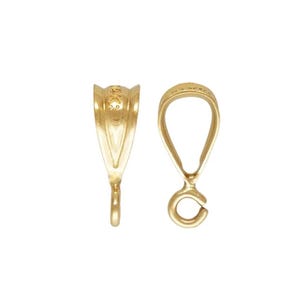May include: Two gold-colored pendant bails. One bail is a V-shape with a loop at the bottom. The other bail is a teardrop shape with a loop at the bottom. Both bails have a shiny finish.
