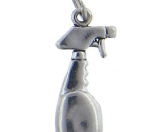 May include: Silver charm in the shape of a spray bottle. The bottle has a silver cap and a silver nozzle.