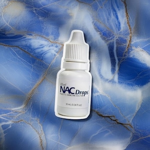May include: A white plastic dropper bottle containing 10 mL (0.34 fl oz) of Eficel NAC Drops N-Acetyl-Carnosine solution. The bottle features a white screw-on cap and a label with dark blue text identifying the product and its volume capacity.