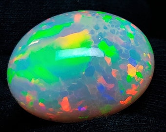 Natürlicher Wabenopal Cabochon: Multi Feuer Edelstein (30x24x14mm, 43.80Crt)