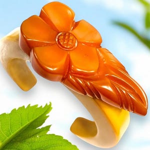 Butterscotch Bakelite Cuff Bracelet with Orange Carved Bakelite Flower