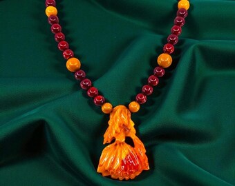 Carved Marbled Orange  Bakelite Flower Pendant on Bakelite Beads Necklace