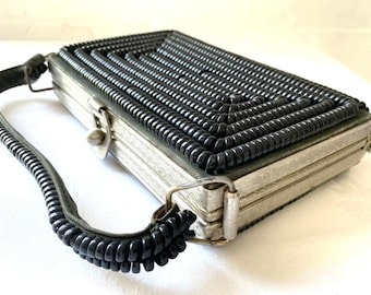 Bolso vintage de bobina negra de los años 40: marco de acero plateado grabado