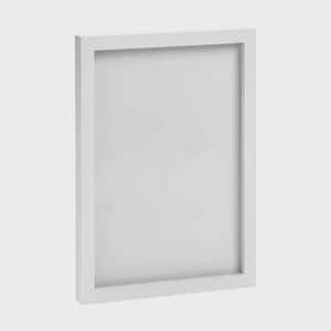 Peut inclure: Un cadre photo rectangulaire blanc au design épuré et minimaliste. Le cadre a une bordure épaisse et une zone encastrée pour afficher des œuvres d'art ou des photographies. Le cadre est fait d'un matériau solide et convient à divers styles de décoration intérieure.