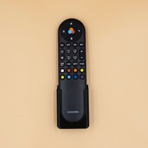 May include: Black remote control with multiple buttons for controlling lighting. The remote has buttons labeled "ON", "OFF", and others for adjusting brightness and color. The brand name "novastella" is printed on the bottom.