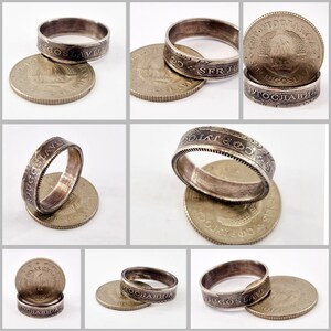 May include: A set of four silver rings made from old Yugoslavian coins. The rings are made from the outer rim of the coins, and the inscription "SFRJ" is visible on the rings. The rings are displayed on top of the coins they were made from.