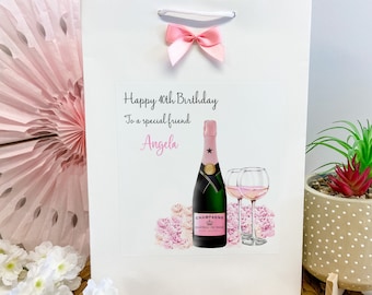 Bolsa de regalo de cumpleaños personalizada con flores rosas y champán