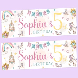 May include: A white banner with a pink and yellow unicorn theme. The banner says "Sophia's 5th Birthday" with a rainbow, stars, and unicorns.