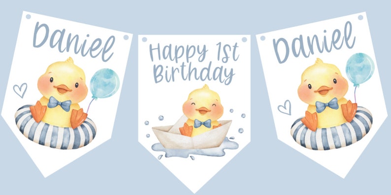 May include: A banner with three pennants featuring a watercolor illustration. The pennants display a yellow duck with a blue bow tie and a balloon. The text "Daniel" and "Happy 1st Birthday" are also present.
