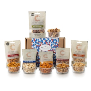 May include: A gift box filled with eight small bowls of various nuts and snacks. The box is brown with a blue and white geometric pattern. The snacks include sweet chilli peanuts and cashews, salted peanuts, dry chilli corn, dry roasted peanuts, and baked salted cashews. The box is labelled "Burmont's Specialty Gifts".