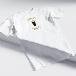 May include: White t-shirt with the text "SPLIT THE G." and a graphic of a pint of beer.