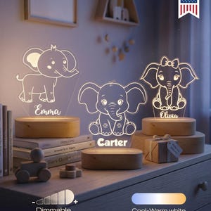 May include: Three illuminated elephant-shaped night lights with personalized names: Emma, Carter, and Olivia. Each light sits on a wooden base. The lights are dimmable and offer cool-warm white light. The image also includes a small wooden toy car and books.