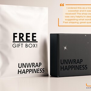 May include: A white gift bag and a black box. The bag reads "FREE GIFT BOX!" and "UNWRAP HAPPINESS" in black text. The box also says "UNWRAP HAPPINESS". The LED Expression logo is at the bottom.