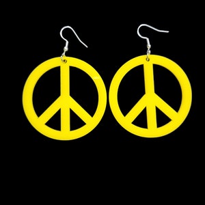 Large Peace sign dangle earrings in yellow!