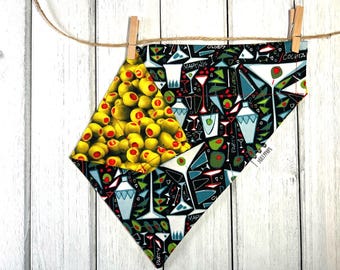 Puede incluir: Un pañuelo negro y blanco con un patrón de copas de martini, aceitunas y las palabras "Martini", "Olives", "Cocktail", "Party" y "Solitipps". Una esquina del pañuelo es un patrón amarillo y verde de aceitunas.