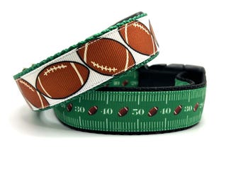 May include: Two dog collars, one with a white background and brown footballs, the other with a green background and white yard lines and brown footballs.