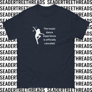 May include: A navy blue t-shirt with a white silhouette of a dancer and the text "The music dance experience is officially canceled."