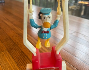 Donald Duck Tricky Trapeze push button Vintage toy (still works!)