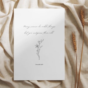 Puede incluir: Una impresión blanca con un dibujo de línea negra de una flor y el texto "Many women do noble things, but you surpass them all. Proverbs 31:29"