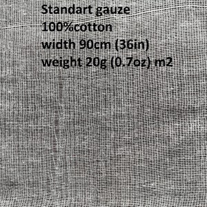 May include: Close-up of a white, woven gauze fabric. The text on the image reads "Standart gauze 100% cotton width 36in weight 0.7oz m2". The fabric has a grid-like pattern.
