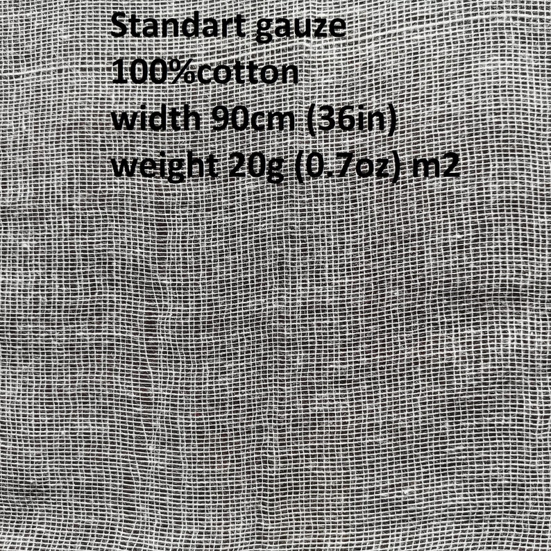 May include: Close-up of a white, woven gauze fabric. The text on the image reads "Standart gauze 100% cotton width 36in weight 0.7oz m2". The fabric has a grid-like pattern.
