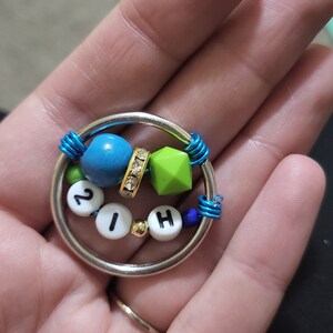 Brinquedo antiestresse com contas personalizável