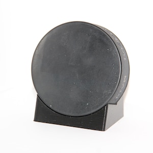 Hockey puck display stand
