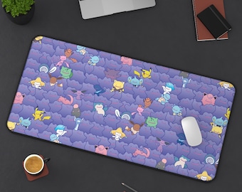 May include: A rectangular purple desk mat featuring a pattern of various cartoon characters. The characters are in different colors, including yellow, pink, blue, and green. A white computer mouse is on the mat. A laptop, coffee cup, and other office supplies are also visible.