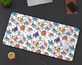 May include: A white mouse pad with a repeating pattern of cartoon Pokemon characters. The characters are in various colors, including blue, red, yellow, and green. The mouse pad is on a black surface.