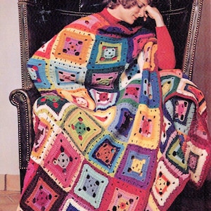 May include: A colorful, handmade crochet blanket featuring a patchwork design of squares in various colors. The blanket is draped over a chair, showcasing its vibrant hues of pink, blue, yellow, and green. The squares have a central design.