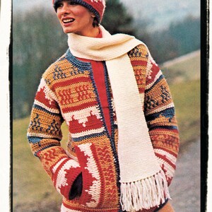 May include: A vintage crochet ensemble featuring a hat, jacket, and scarf. The jacket has a red, white, blue, and tan geometric pattern. The scarf is cream-colored with fringe. The hat mirrors the jacket's design. A retro, cozy, and handmade look.