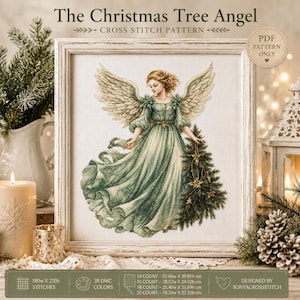 May include: A cross stitch pattern titled The Christmas Tree Angel featuring an illustration of an angel with large wings wearing a flowing sage green gown and holding a small decorated Christmas tree. The pattern includes 39 DMC colors.
