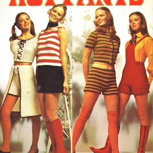 May include: A retro magazine cover showcasing knitted outfits. The outfits include a white crochet set, a red and white striped top with a black skirt, a striped top and shorts set, and red overalls. The text "HOT PANTS" is displayed in large orange letters.