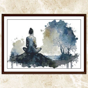 May include: A watercolor painting of a person sitting in a meditative pose on a rock overlooking a body of water. The background features a tree and a blue sky with white clouds.