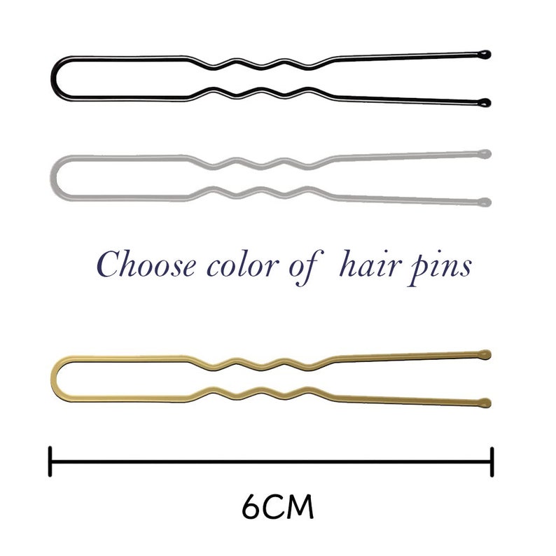 May include: Three hair pins in black, silver, and gold. Each pin is 6 cm long and has a wavy design. Choose your favourite colour.