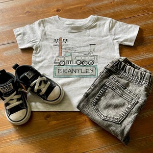 Lineman/Power bucket truck design with name plate | DTF | infant/toddler Shirt