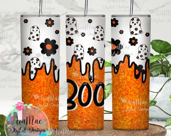May include: Three cylindrical tumblers with metal straws featuring a white top section with black and orange flower and ghost patterns, and a textured orange bottom section separated by a black drip design. The center tumbler displays the word BOO.