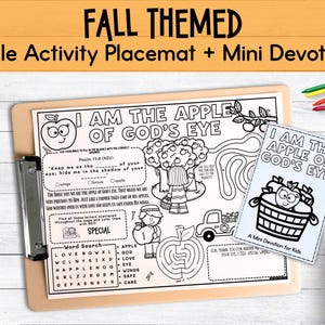 May include: Fall-themed Bible activity placemat and mini devotion. The placemat features the text "I AM THE APPLE OF GOD'S EYE" with a word search and maze. A mini devotion booklet is also included.
