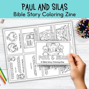May include: A black and white "Paul and Silas Bible Story Coloring Zine" with illustrations and text. The cover features the title and two figures. Colored pencils and crayons are visible.