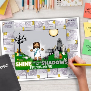 May include: A Bible seek-and-find activity sheet with colorful illustrations, including Jesus, a graveyard, and the text "Shine through the Shadows." A black Bible and sticky notes are also visible.