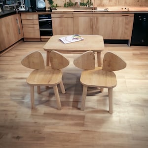 Kids table and chairs set is a part of montessori furniture to support childrens creativity . Activity table with chair is modern and minimalistic. Wooden kids table with two chair will enrich your kids room  touch to your kids furniture,