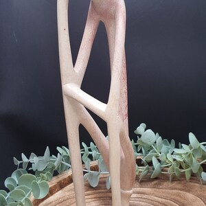 A lovely Vintage African Soapstone Abstract of an adult "Thinking or Worry Wort" Carving from Kenya