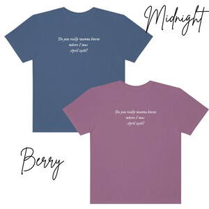 May include: Two t-shirts in different colors, one blue and one purple, with the same text printed on the front: "Do you really wanna know where I was April 29th?" The text is in white and the shirts are both crew neck.