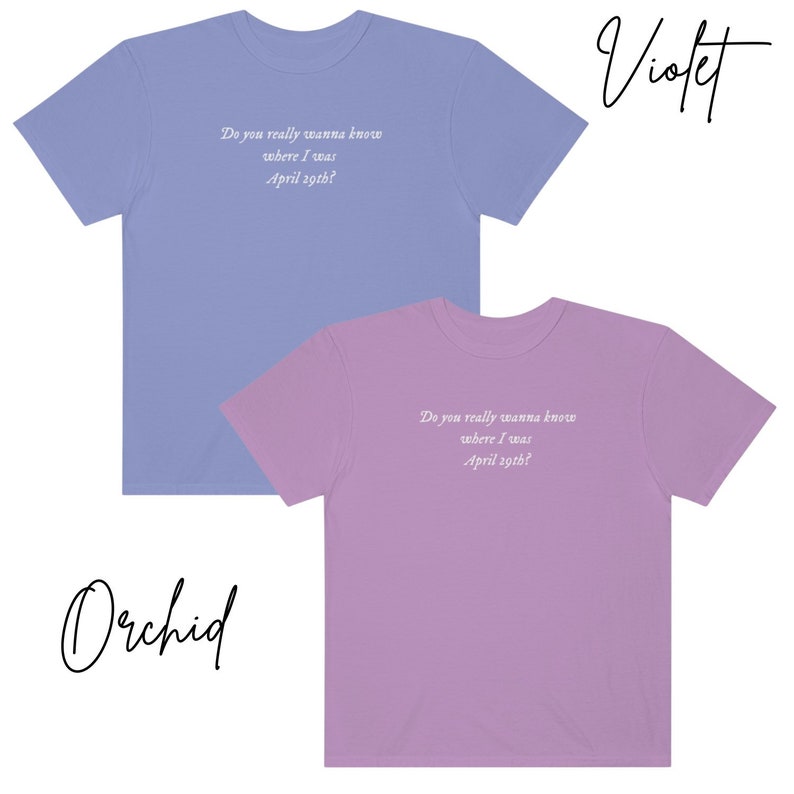 May include: Two t-shirts, one light blue and one light purple, with the text "Do you really wanna know where I was April 29th?" printed on the front. The text is in white.