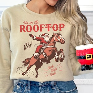 Vintage Cowboy Santa auf bockendem Pferd PNG Sublimation Digital Download, Auf dem Dach
